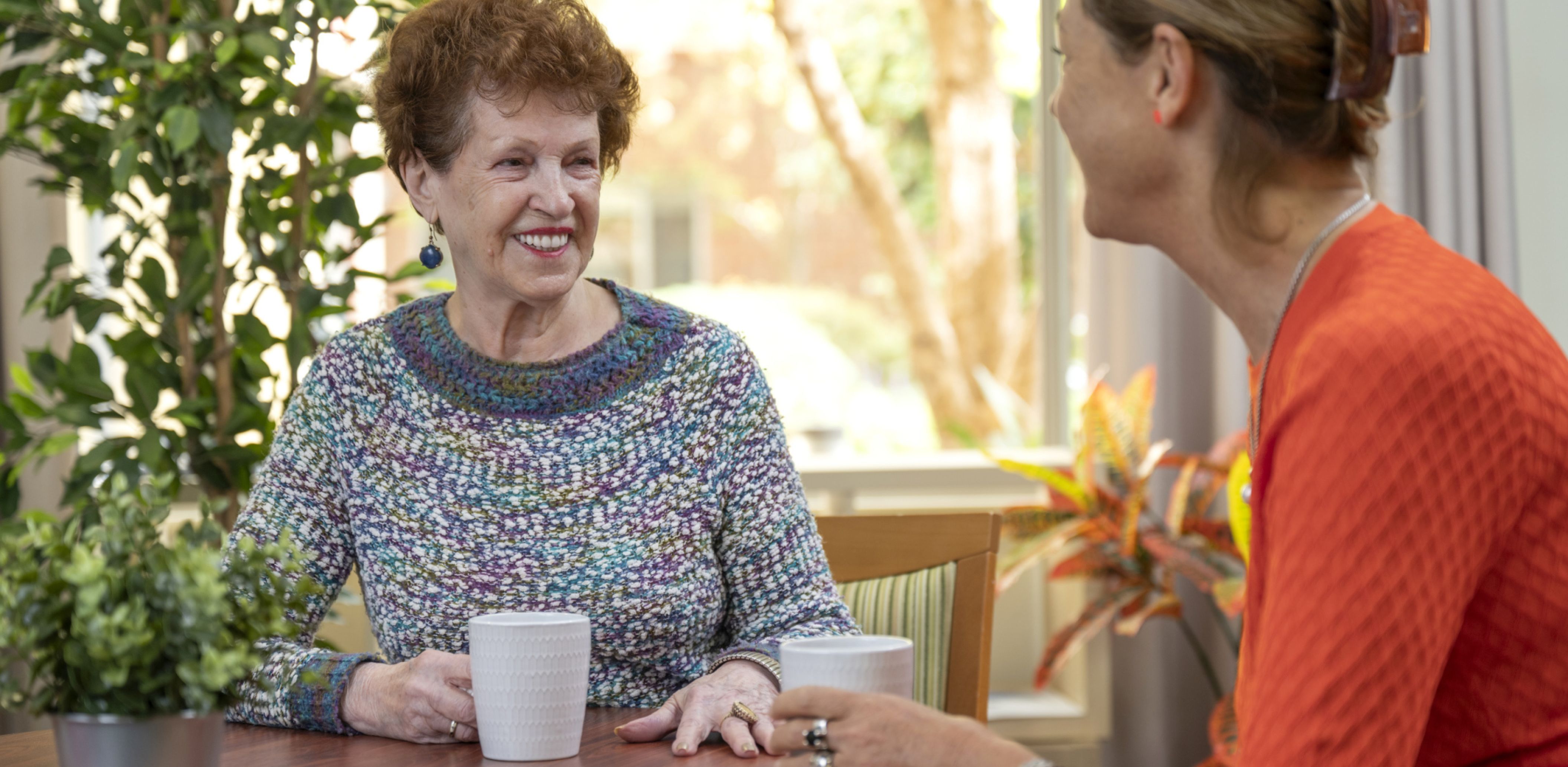 Eldercare resident and staff member