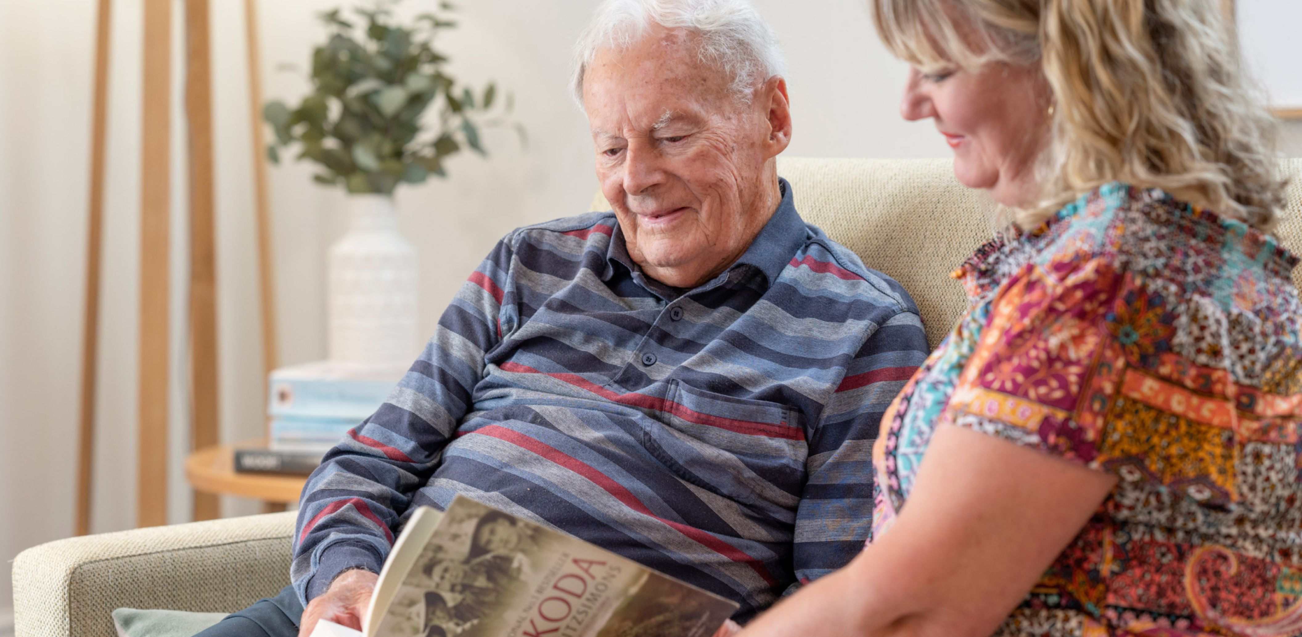 Eldercare resident Bernie spending time with his daughter at aged care home Oxford.