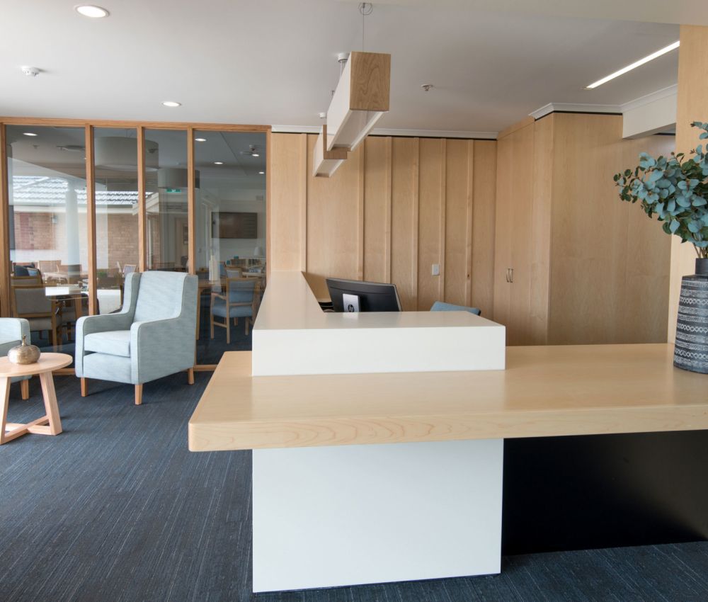 Reception and café seating area at Eldercare Oxford