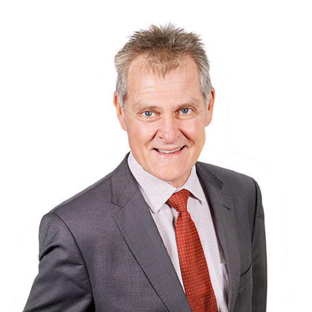 Eldercare board chair Prof Justin Beilby smiles at the camera.