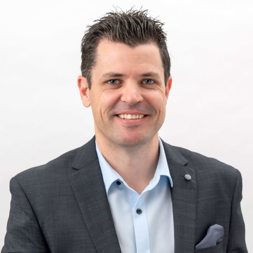 Eldercare General Manager Residential Care Jarrod Mudie smiles at the camera.