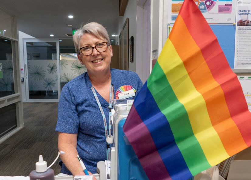 EN Tracy with an appropriately-decorated medicine trolley at Eldercare Acacia Court.