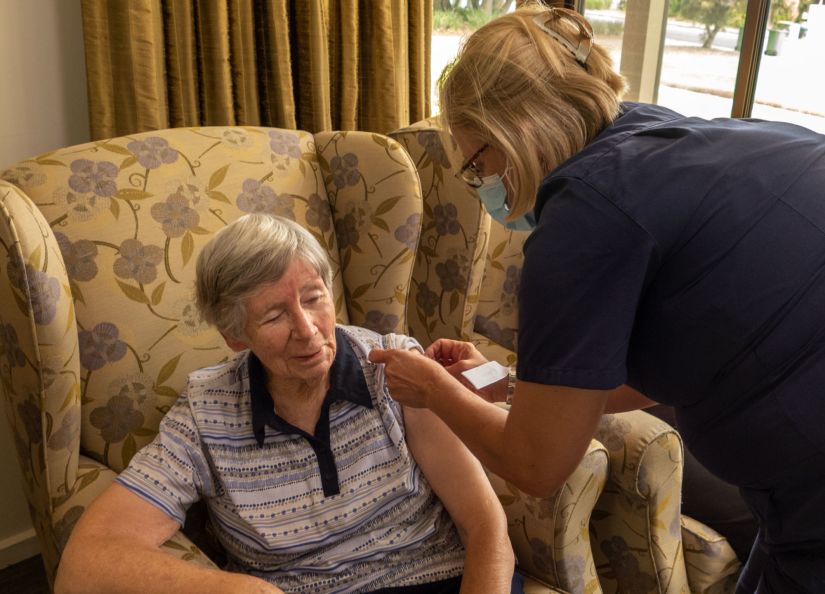 Eldercare Sash Ferguson resident receiving the COVID-19 vaccine.