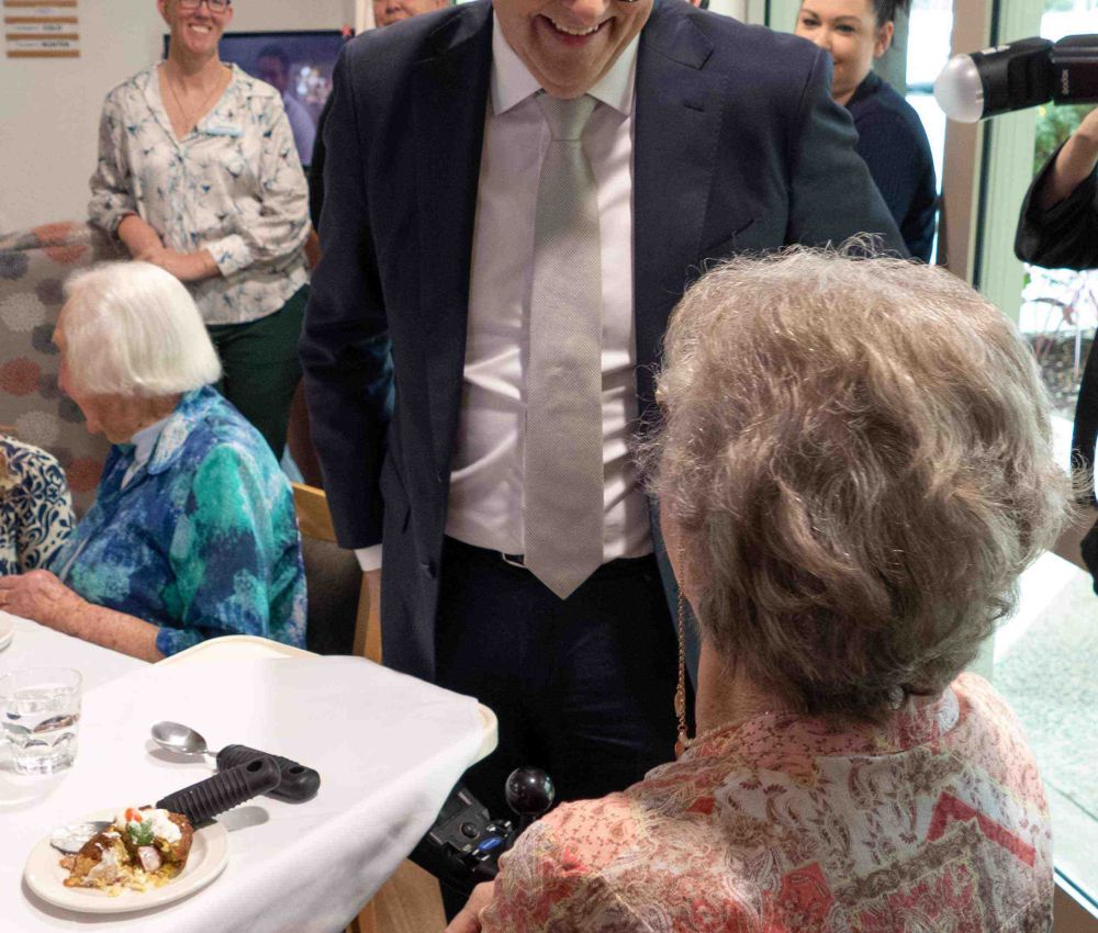 The Prime Minister Anthony Albanese chat with a resident.