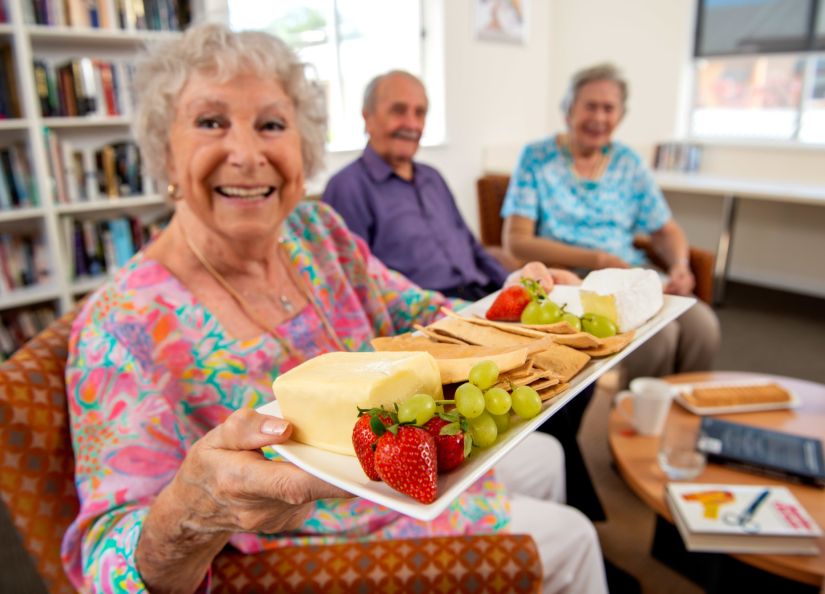 Eldercare College Green Retirement Living residents smiling at the camera.