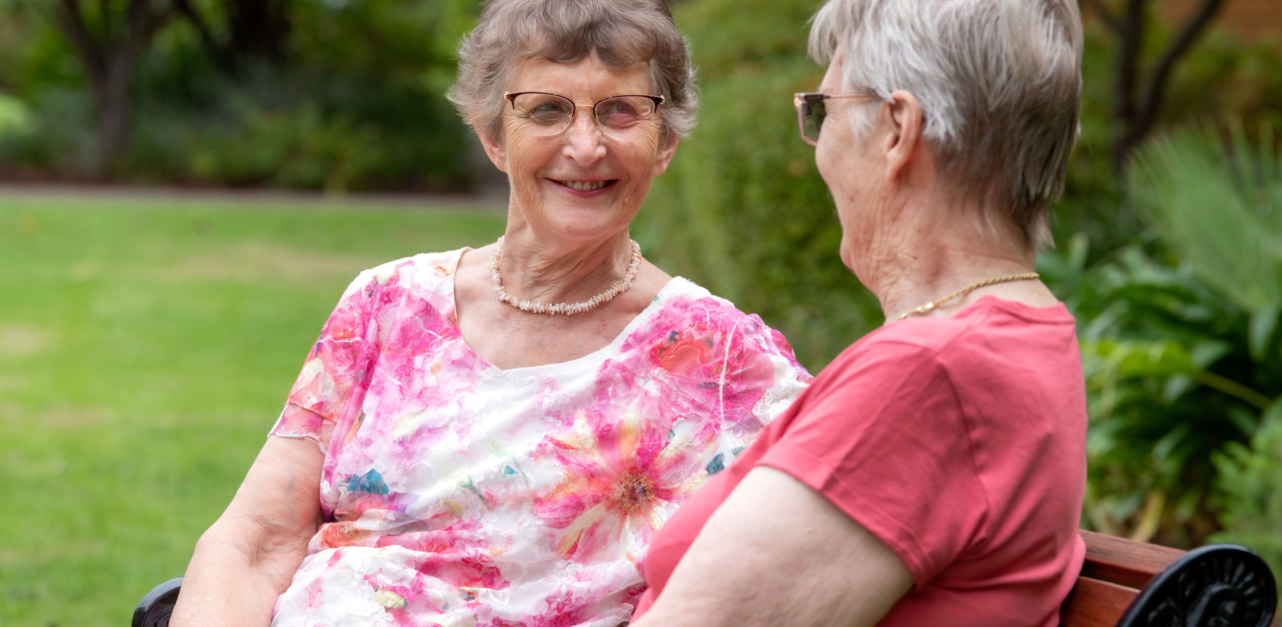 Eldercare The Village Retirement Living residents looking at each other.