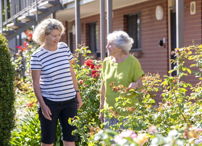 Eldercare Oxford Retirement Living resident and a family member talking.