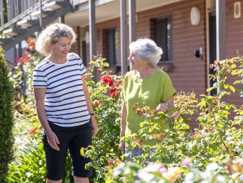 Eldercare Oxford Retirement Living resident and a family member talking.