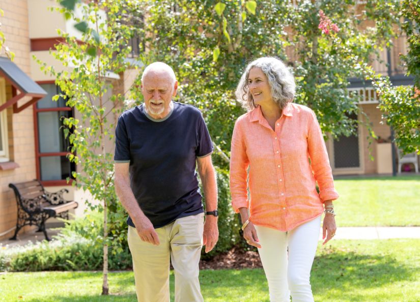Eldercare Sash Ferguson Retirement Living residents walking and smiling.