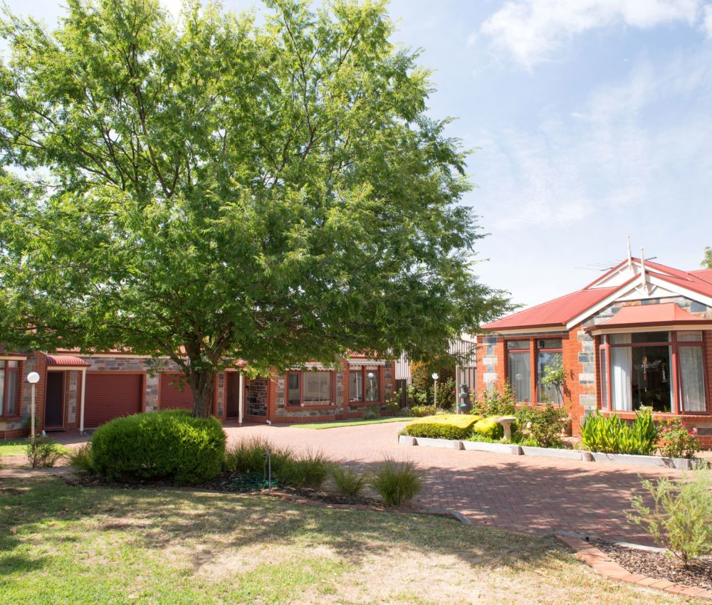 Eldercare Exhibition Court Retirement Living front garden area.