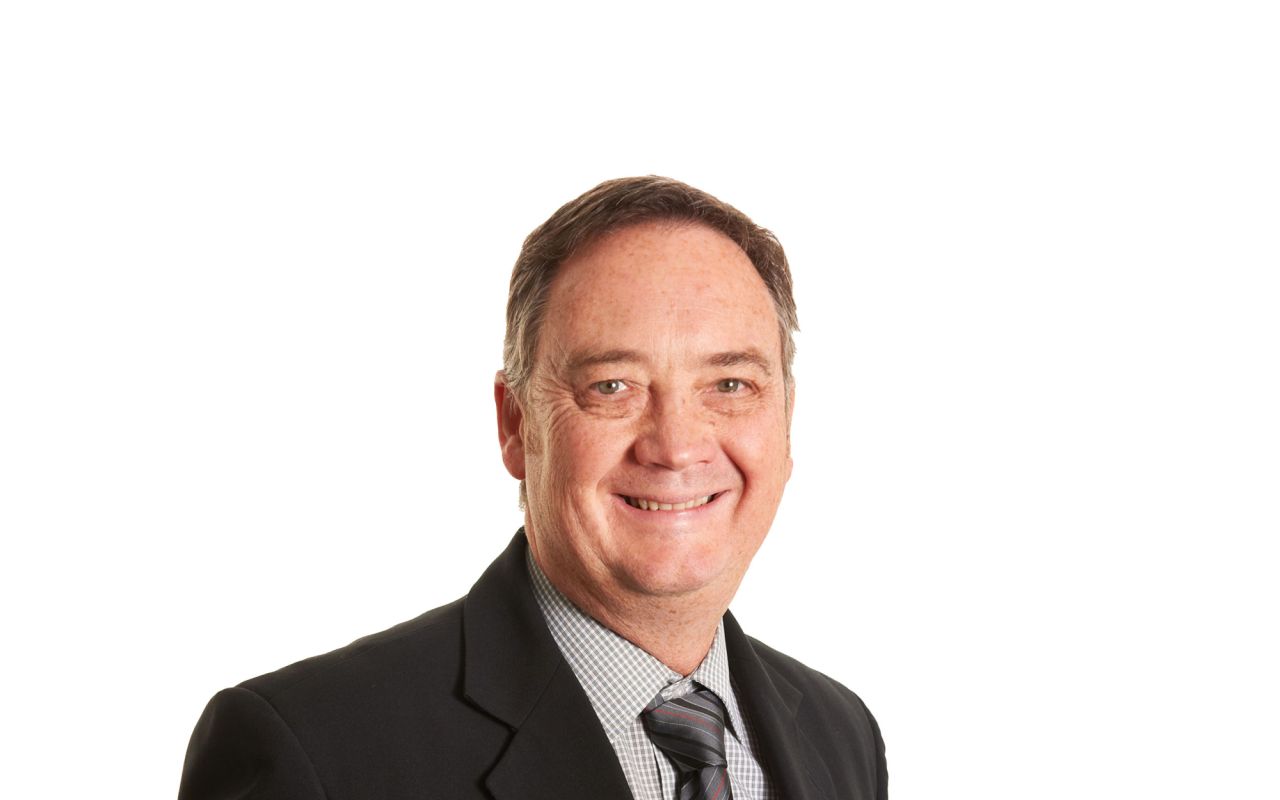 Eldercare The Lodge Site Operations Manager Mark Butler smiling at the camera.